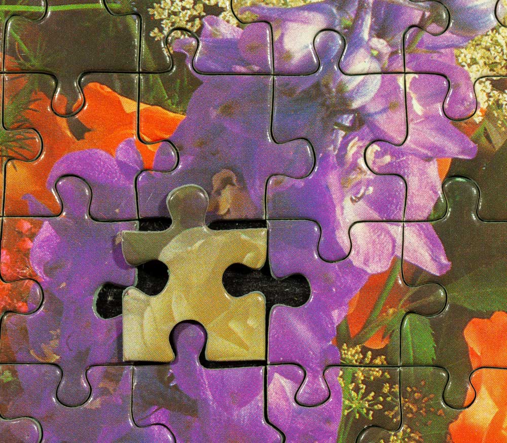 Puzzle pieces that do not fit together quite right.
